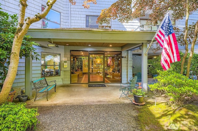 7930SE 34th St Unit 209, Mercer Island, WA 98040 - doorway to property featuring a patio area and french doors