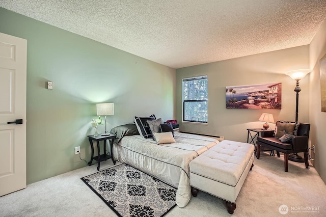 7930SE 34th St Unit 209, Mercer Island, WA 98040 - bedroom featuring carpet and a textured ceiling