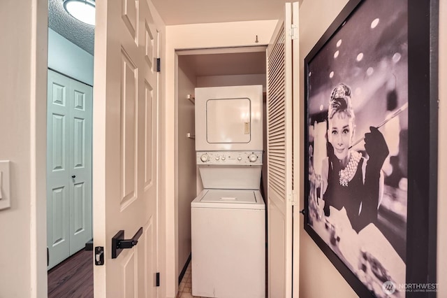 7930SE 34th St Unit 209, Mercer Island, WA 98040 - laundry area featuring stacked washer / drying machine