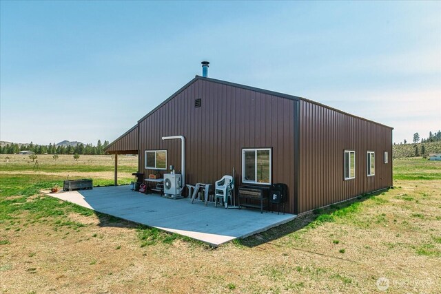 40359 Barbara Ln N, Davenport, WA 99122 - rear view of property featuring a patio area and a lawn