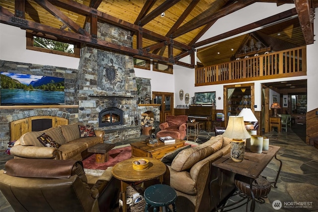 6286 Five Mile Rd, The Dalles, OR 98058 - living room featuring a fireplace, high vaulted ceiling, a wooden ceiling with exposed beams, and stone finish floors