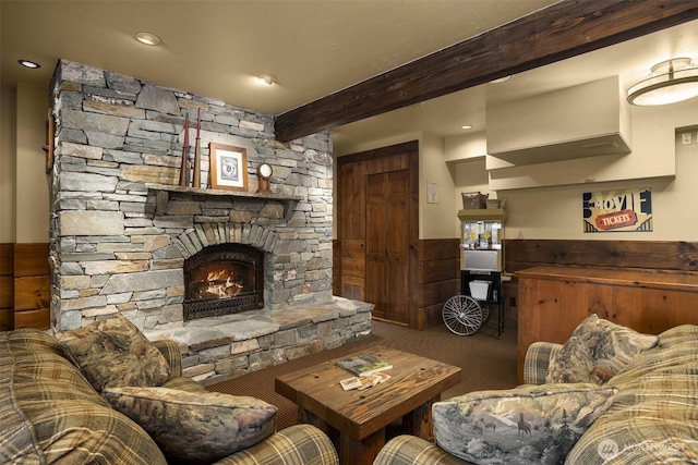 6286 Five Mile Rd, The Dalles, OR 98058 - living area with beamed ceiling, a stone fireplace, a wainscoted wall, and recessed lighting
