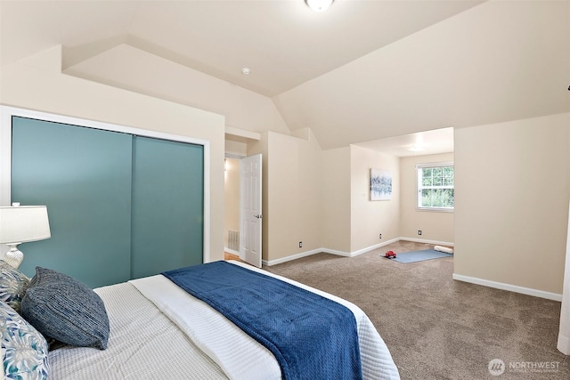 8495 Landing Ln SE, Port Orchard, WA 98367 - bedroom featuring carpet flooring, lofted ceiling, and a closet