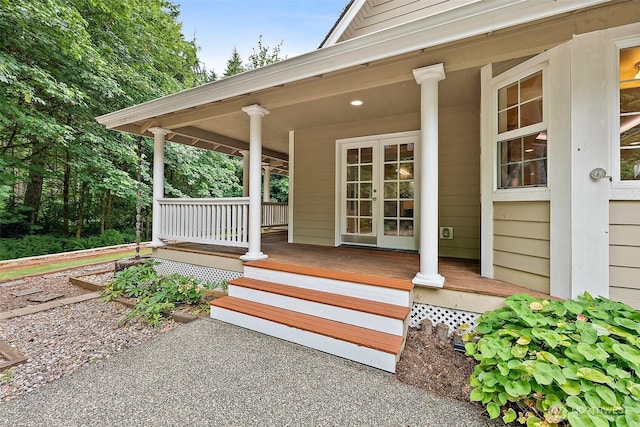 8495 Landing Ln SE, Port Orchard, WA 98367 - view of exterior entry with a porch and french doors