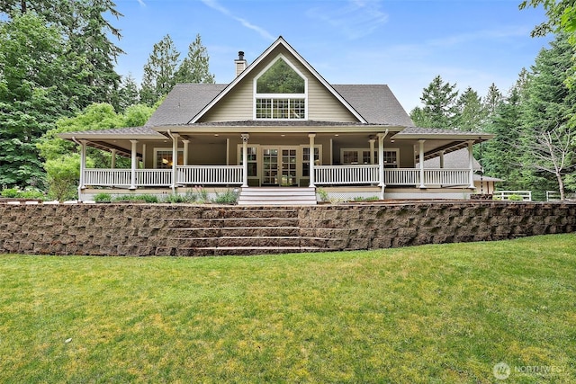 8495 Landing Ln SE, Port Orchard, WA 98367 - rear view of property with a chimney, a lawn, and a shingled roof