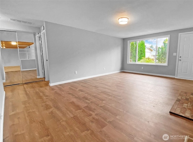 15518SE 304th Pl, Kent, WA 98042 - spare room with wood finished floors