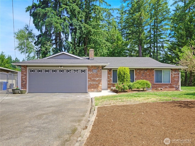 15518SE 304th Pl, Kent, WA 98042 - ranch-style house featuring concrete driveway, a chimney, a garage, and brick siding