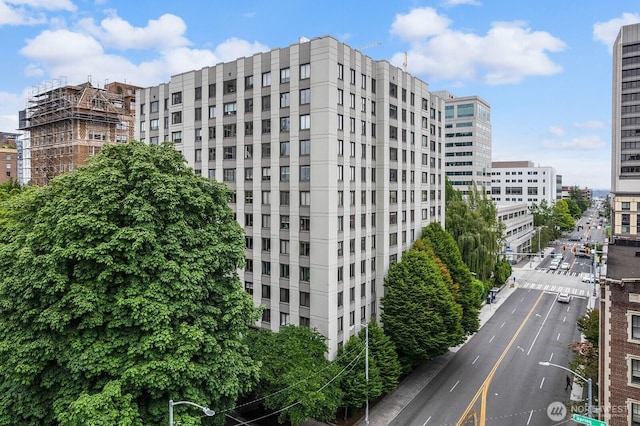 1105 Spring St Unit 407, Seattle, WA 98104 - view of apartment building / complex featuring a city view