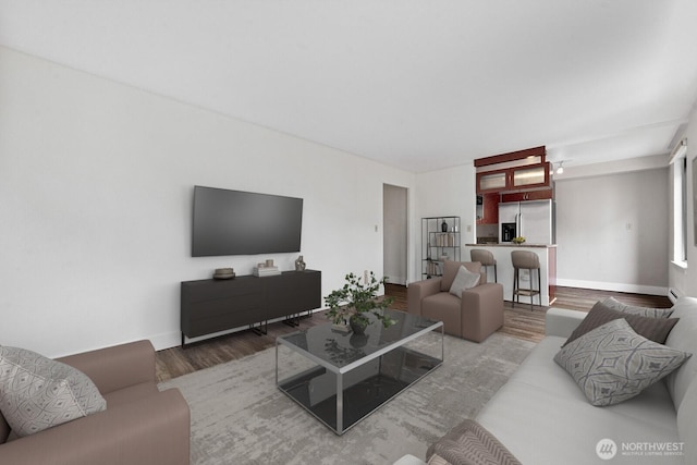 1105 Spring St Unit 407, Seattle, WA 98104 - living area with wood finished floors and baseboards