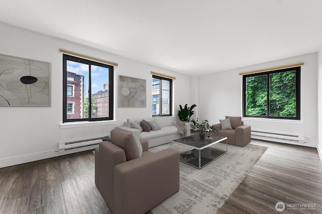 1105 Spring St Unit 407, Seattle, WA 98104 - living area featuring a baseboard heating unit and wood finished floors