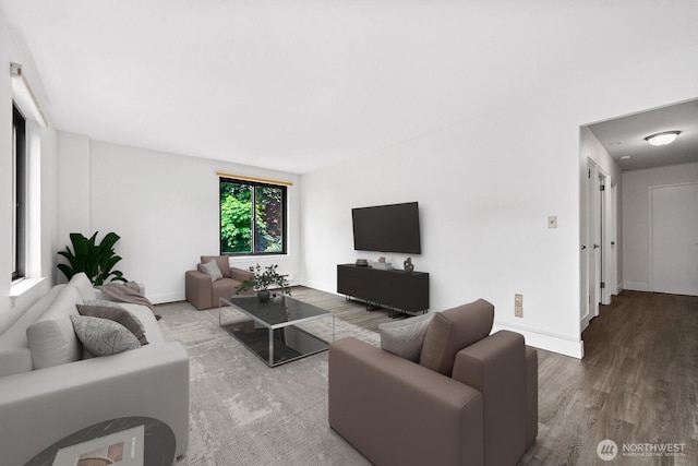 1105 Spring St Unit 407, Seattle, WA 98104 - living area featuring wood finished floors and baseboards
