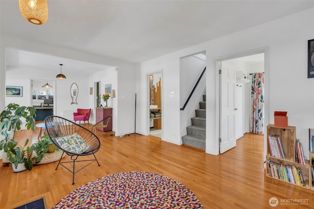 8554 16th Ave NW, Seattle, WA 98117 - sitting room featuring wood finished floors and stairs