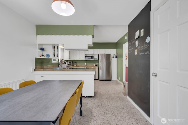 8554 16th Ave NW, Seattle, WA 98117 - kitchen with appliances with stainless steel finishes, white cabinets, and open shelves