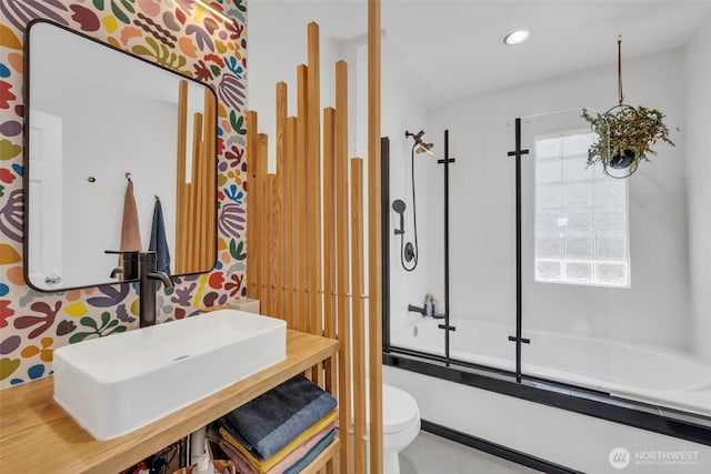 8554 16th Ave NW, Seattle, WA 98117 - full bathroom featuring shower / bath combination with glass door, recessed lighting, and vanity