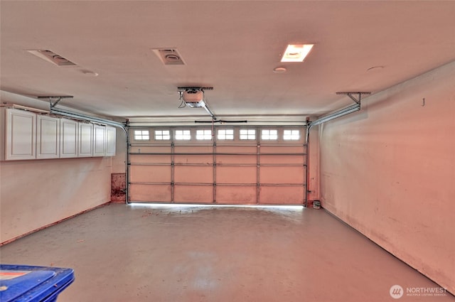 3030 128th Ave SE Unit 6, Bellevue, WA 98005 - garage featuring a garage door opener