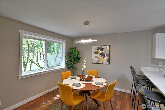 3030 128th Ave SE Unit 6, Bellevue, WA 98005 - dining area featuring dark wood-type flooring and a chandelier