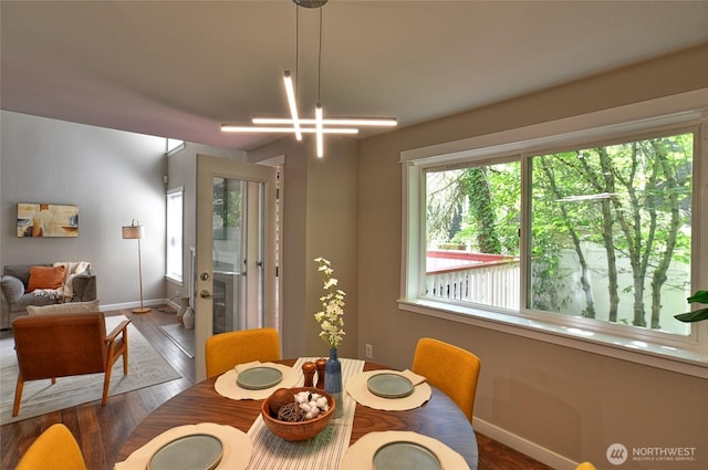 3030 128th Ave SE Unit 6, Bellevue, WA 98005 - dining space with baseboards and wood finished floors