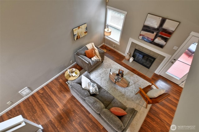 3030 128th Ave SE Unit 6, Bellevue, WA 98005 - living room with wood finished floors and a tile fireplace