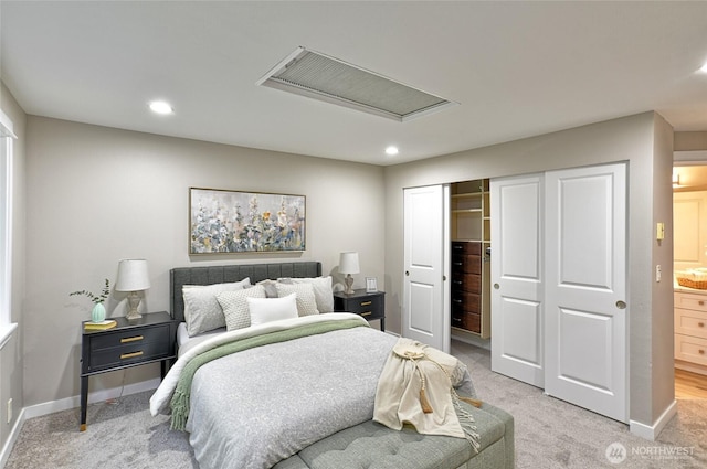 3030 128th Ave SE Unit 6, Bellevue, WA 98005 - bedroom featuring light carpet, a closet, recessed lighting, and connected bathroom