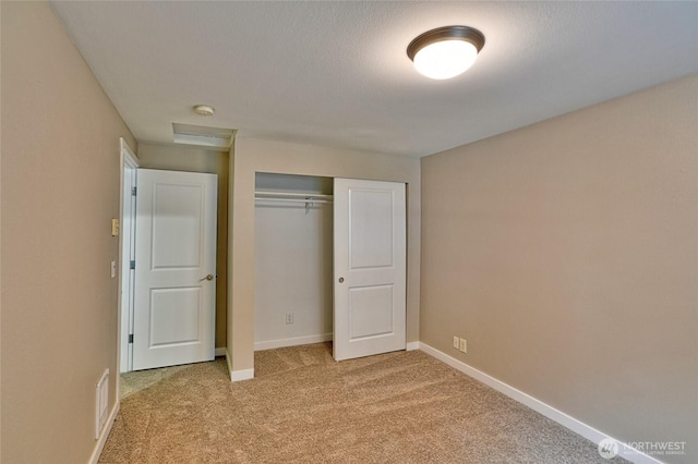 3030 128th Ave SE Unit 6, Bellevue, WA 98005 - unfurnished bedroom featuring light colored carpet and a closet