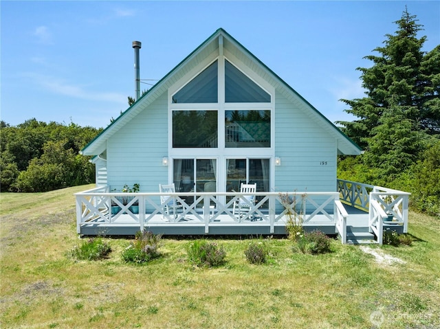 195 Ocean Shores Blvd SW, Ocean Shores, WA 98569 - rear view of house featuring a lawn and a wooden deck