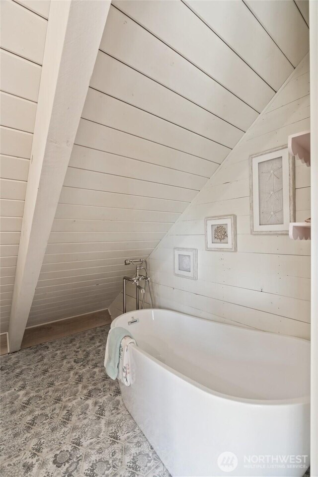 195 Ocean Shores Blvd SW, Ocean Shores, WA 98569 - bathroom with vaulted ceiling, a tub, and wood ceiling