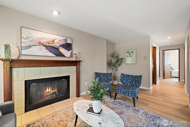 140 Summit Ave N Unit A6, Kent, WA 98030 - living room with a tiled fireplace, wood finished floors, and recessed lighting