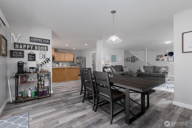17814 97th Ln E, Puyallup, WA 98375 - dining space with light wood-type flooring, recessed lighting, and stairs