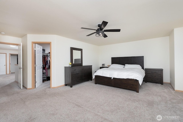 17814 97th Ln E, Puyallup, WA 98375 - bedroom featuring carpet flooring, a spacious closet, a closet, and a ceiling fan