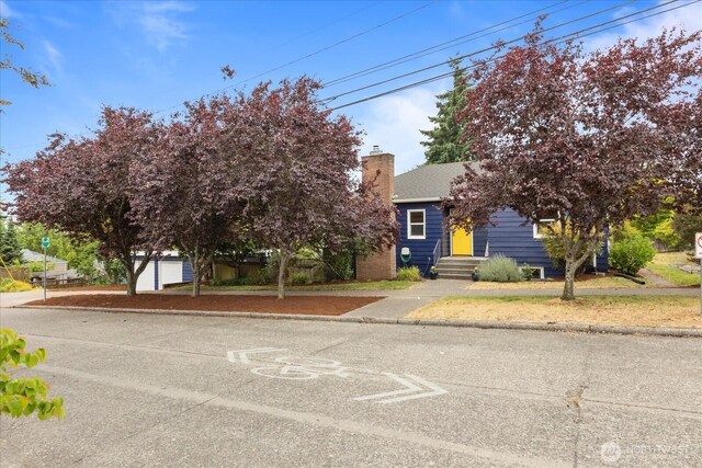 3604 SW Graham St, Seattle, WA 98126 - obstructed view of property featuring a chimney