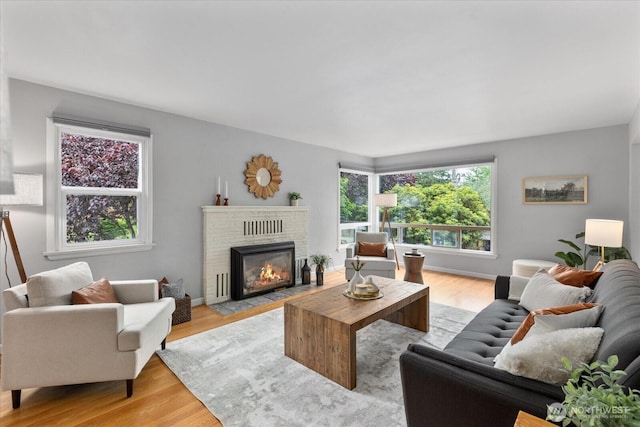 3604 SW Graham St, Seattle, WA 98126 - living area with light wood finished floors and a fireplace