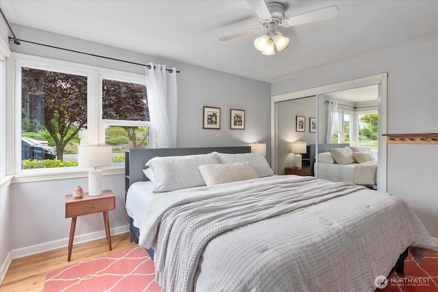 3604 SW Graham St, Seattle, WA 98126 - bedroom with wood finished floors, a closet, and ceiling fan