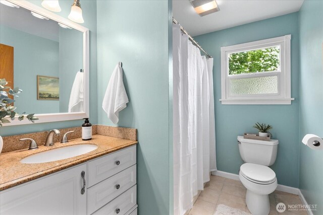 3604 SW Graham St, Seattle, WA 98126 - full bathroom with vanity, tile patterned floors, and curtained shower