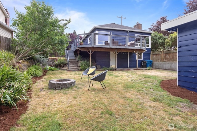 3604 SW Graham St, Seattle, WA 98126 - back of property featuring a fire pit, stairs, a wooden deck, and a chimney