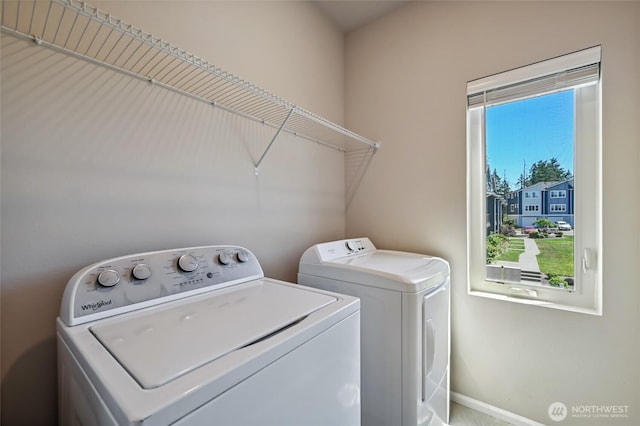 17401 118th Avenue Ct E Unit A, Puyallup, WA 98374 - washroom featuring washing machine and clothes dryer and baseboards