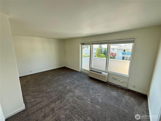 155 Lavender Ct Unit 47, Wenatchee, WA 98801 - empty room featuring dark carpet, a wall unit AC, and baseboards