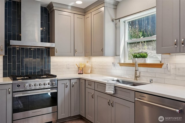 29664 127th Pl SE, Auburn, WA 98092 - kitchen featuring stainless steel appliances, gray cabinets, wall chimney range hood, light countertops, and tasteful backsplash