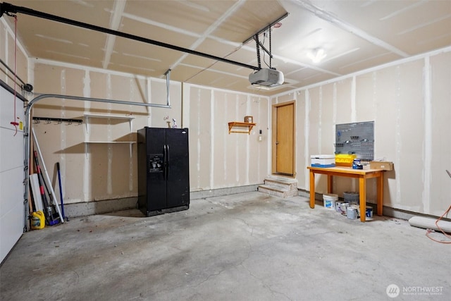29664 127th Pl SE, Auburn, WA 98092 - garage featuring a garage door opener and a workshop area