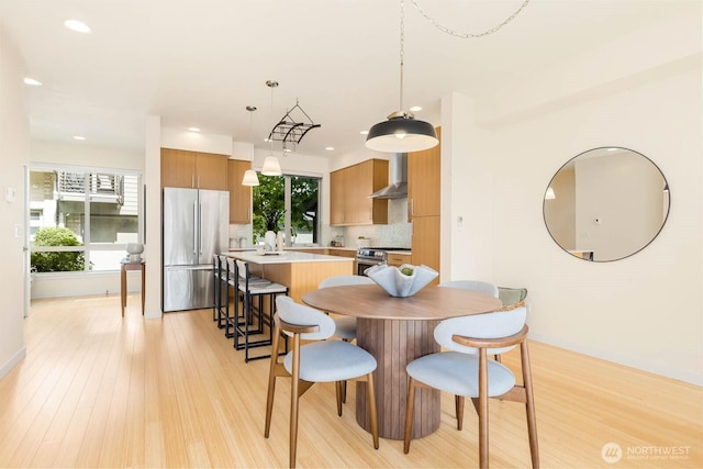 5175 42nd Ave S, Seattle, WA 98118 - dining area featuring plenty of natural light, light wood-type flooring, and recessed lighting
