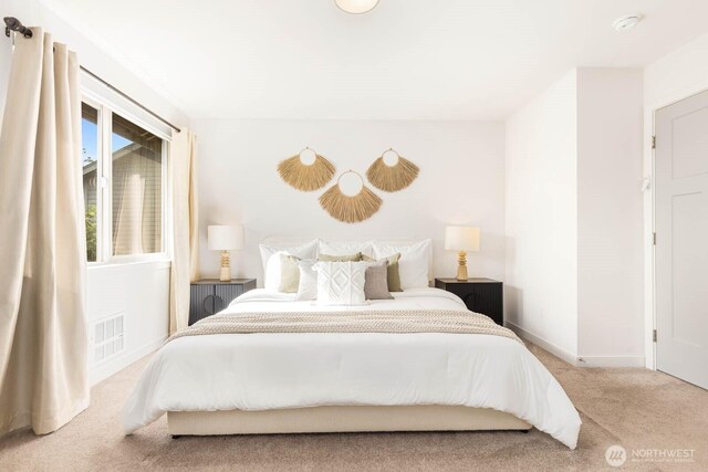 5175 42nd Ave S, Seattle, WA 98118 - bedroom featuring carpet floors and baseboards