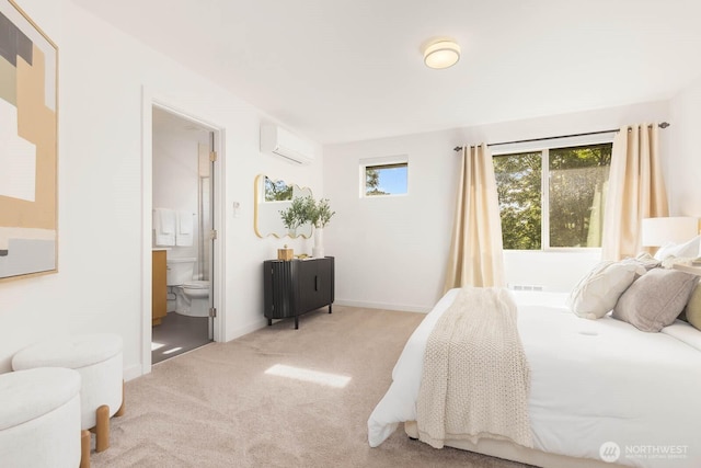 5175 42nd Ave S, Seattle, WA 98118 - carpeted bedroom featuring a wall mounted air conditioner and connected bathroom