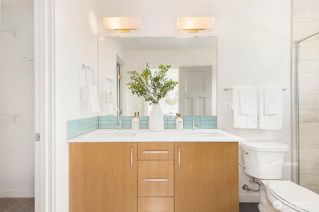 5175 42nd Ave S, Seattle, WA 98118 - bathroom with double vanity, tiled shower, tasteful backsplash, and a walk in closet