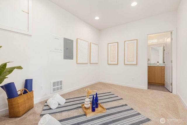 5175 42nd Ave S, Seattle, WA 98118 - living area featuring light carpet, electric panel, and recessed lighting
