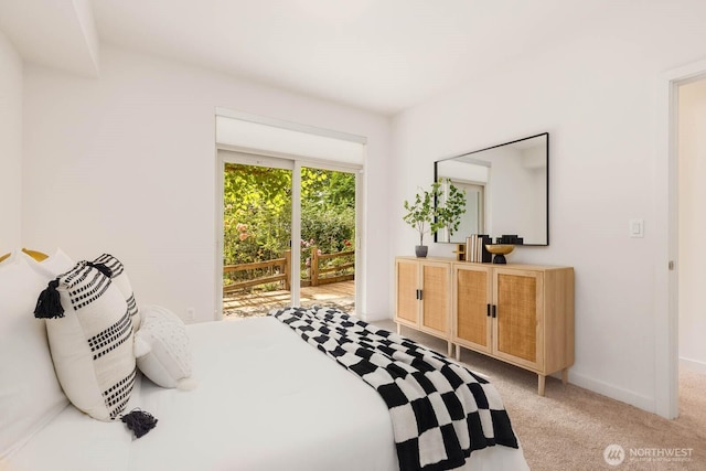 5175 42nd Ave S, Seattle, WA 98118 - bedroom with light carpet and access to outside