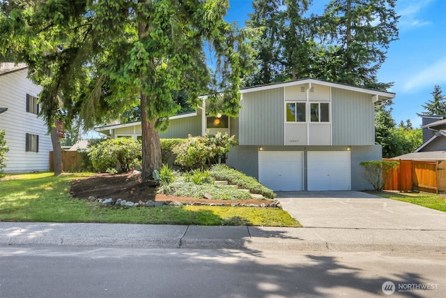 12427 NE 141st Way, Kirkland, WA 98034 - view of front facade with a garage and concrete driveway