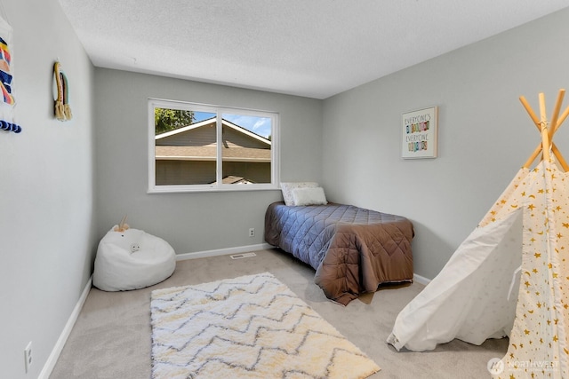 12427 NE 141st Way, Kirkland, WA 98034 - bedroom with carpet and a textured ceiling