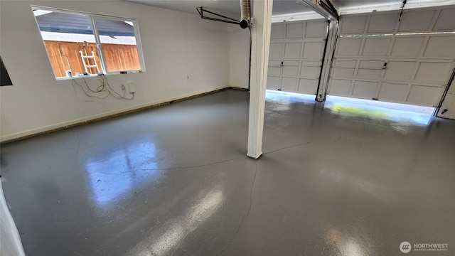 12427 NE 141st Way, Kirkland, WA 98034 - garage featuring baseboards
