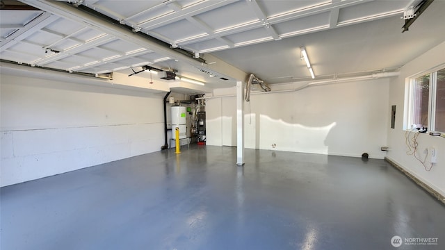 12427 NE 141st Way, Kirkland, WA 98034 - garage with a garage door opener, water heater, and electric panel