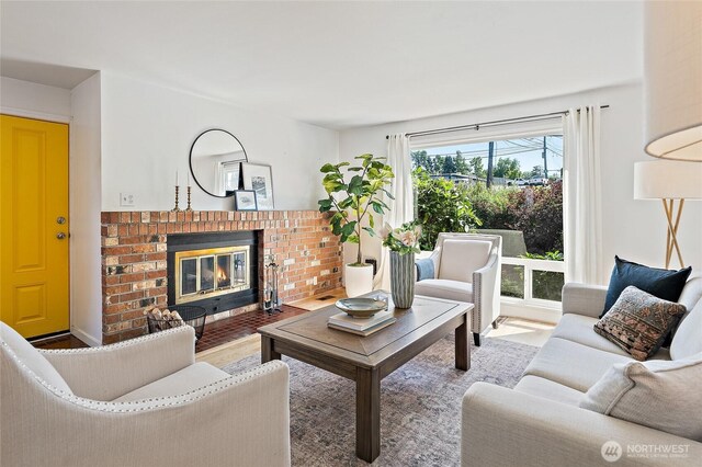 4603 15th Ave S, Seattle, WA 98108 - living room with a brick fireplace and wood finished floors