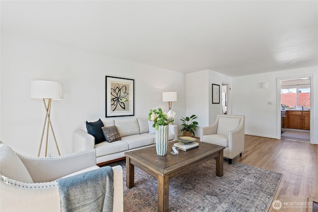 4603 15th Ave S, Seattle, WA 98108 - living room with light wood finished floors and baseboards